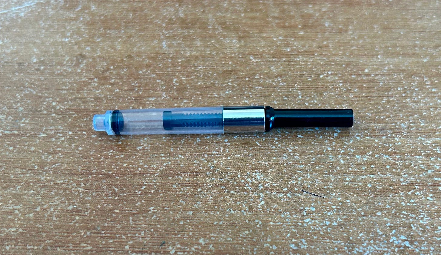 An ink cartridge converter from Ellington Pens which has broken. An ink cartridge converter from Ellington Pens which has broken.