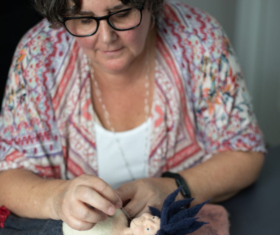 Stacy Vajta needle felting a spirit doll