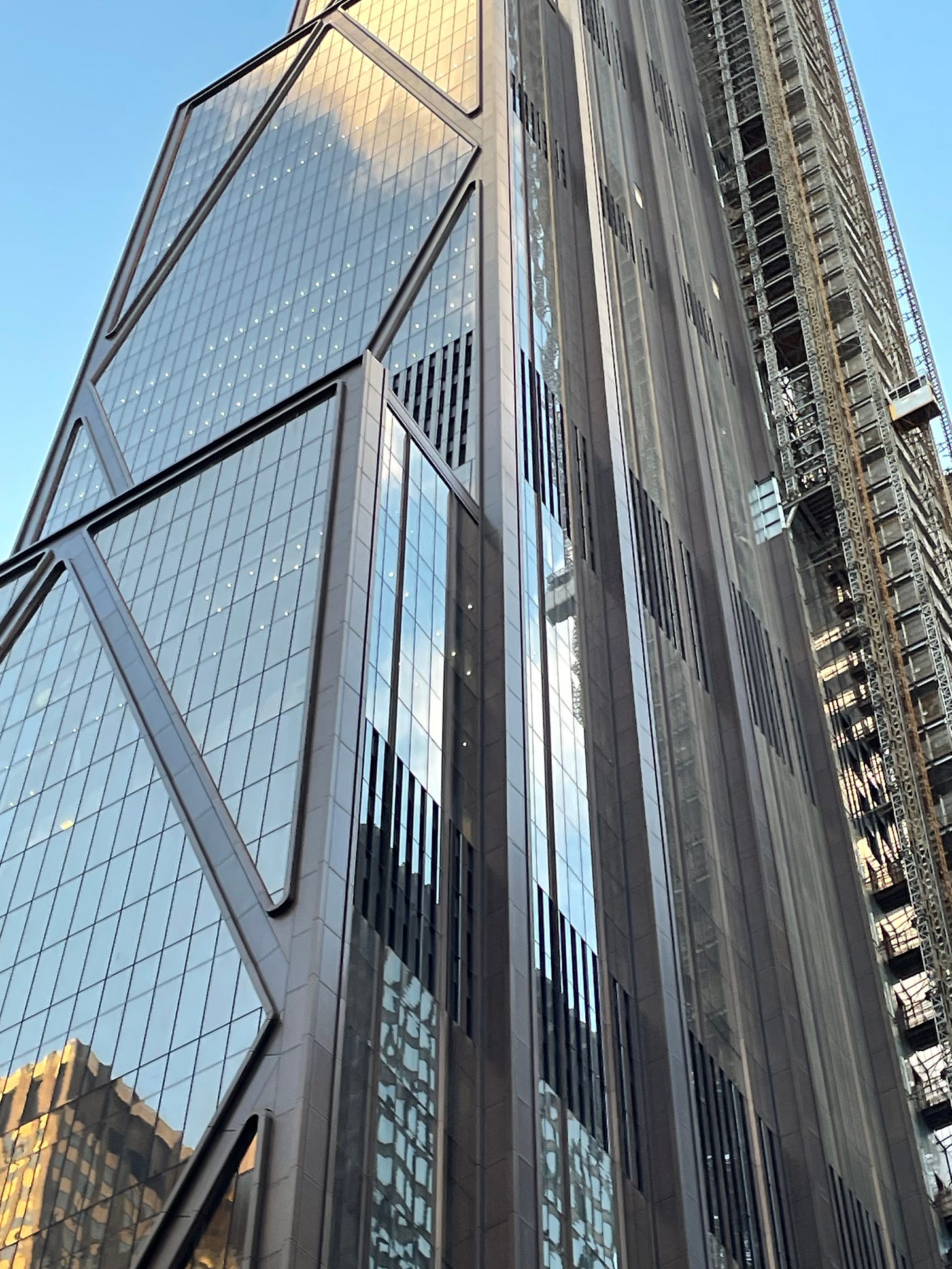 a close up view of the steel and glass exterior of 270 Park