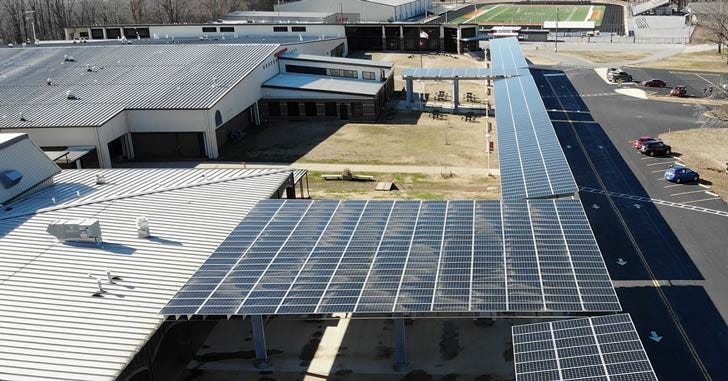 School uses solar panel savings to give teachers $15K raises