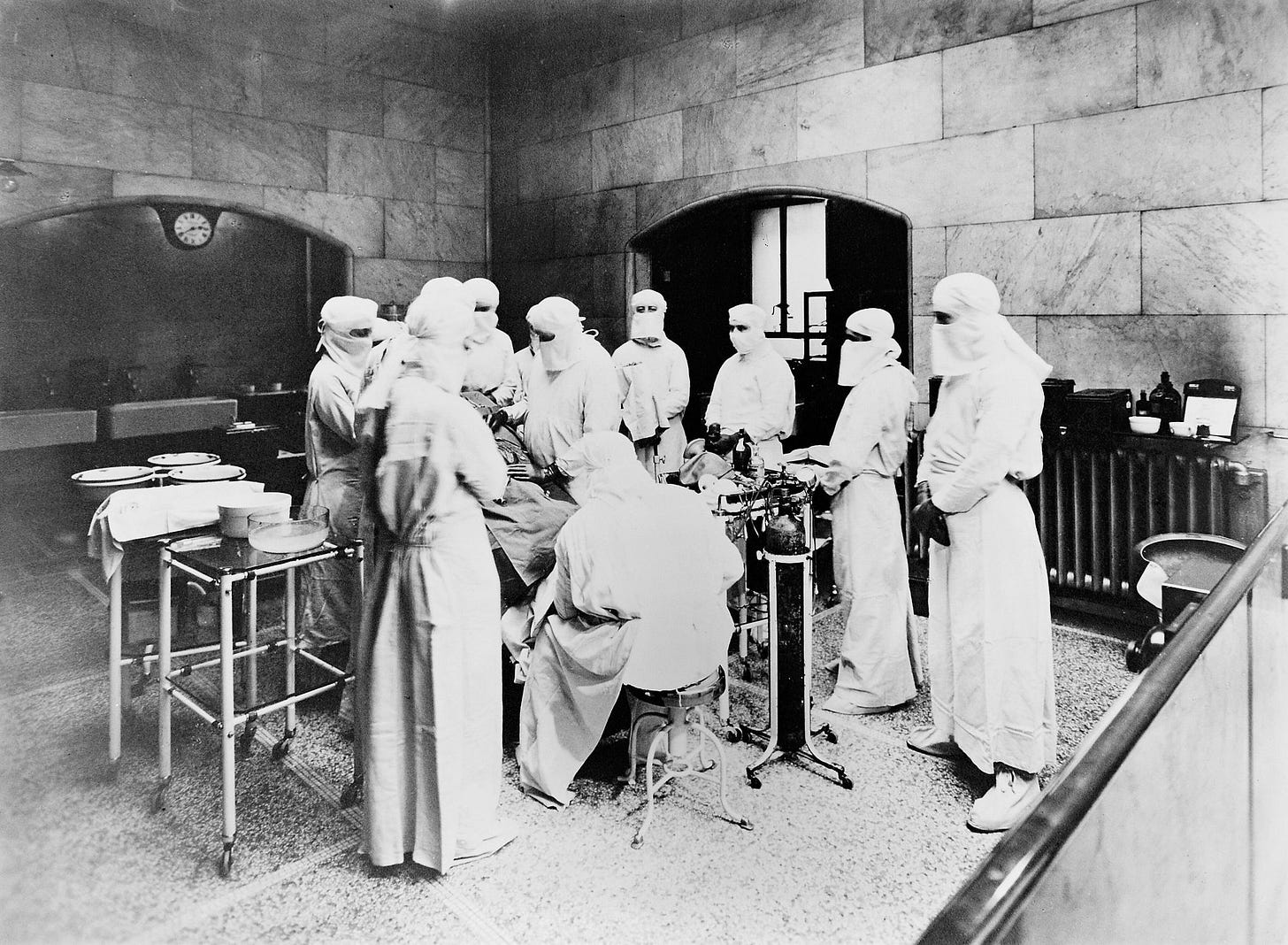 Black and white photo of an operation taking place at the Middlesex Hospital.