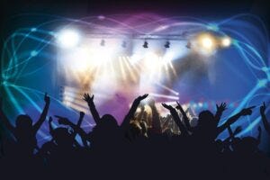 audience members watching a concert