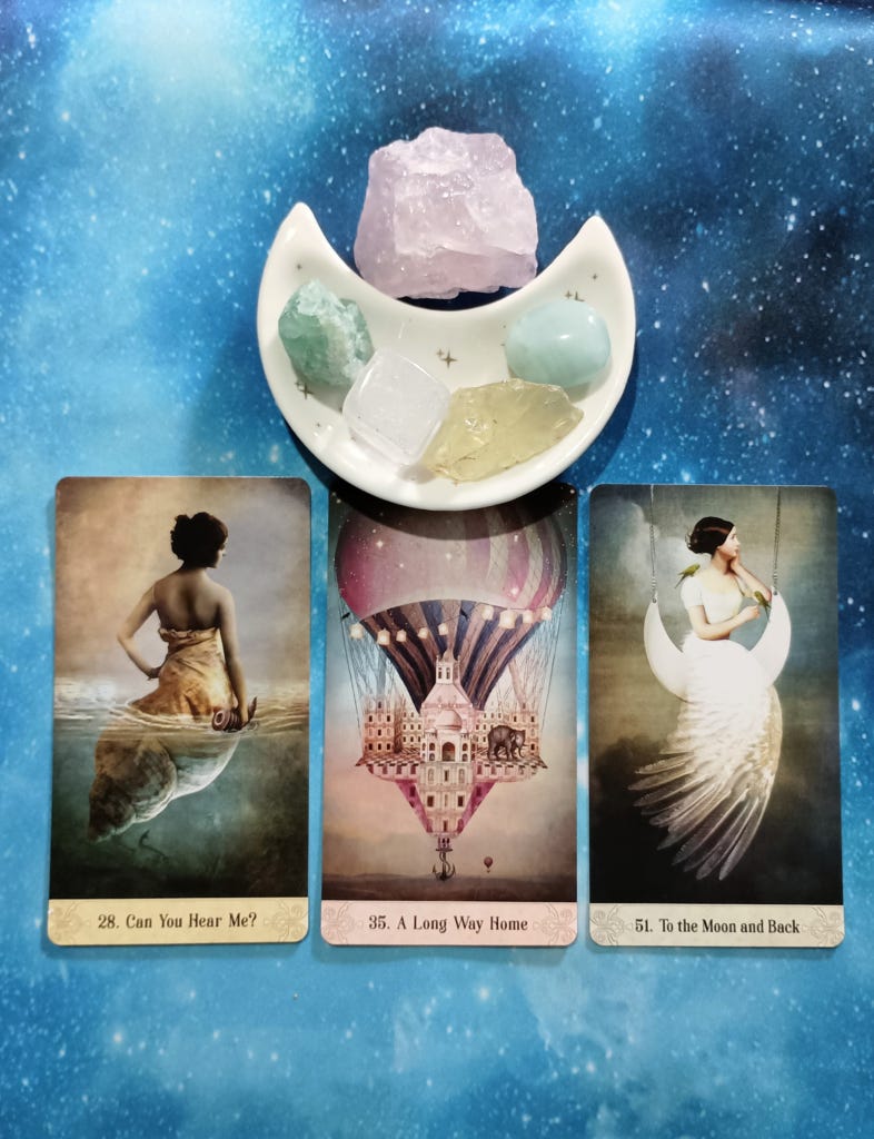 Keep Swimming! A Message From the Universe, 3 Oracle of Mystical Moments cards and crystals on a starry blue background Keep Swimming! A Message From the Universe, 3 Oracle of Mystical Moments cards and crystals on a starry blue background