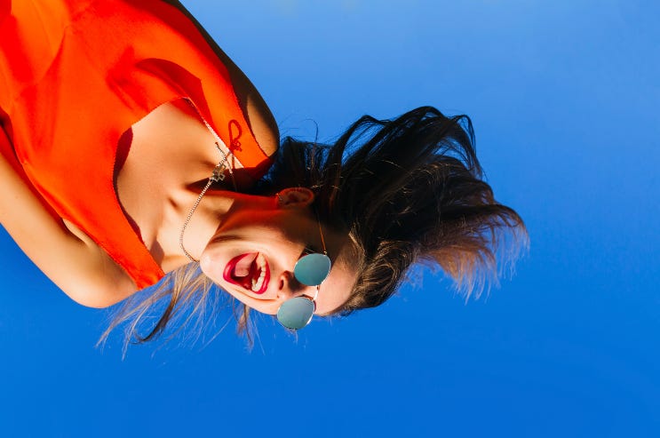 Girl hanging outward on an amusement park ride Girl hanging outward on an amusement park ride