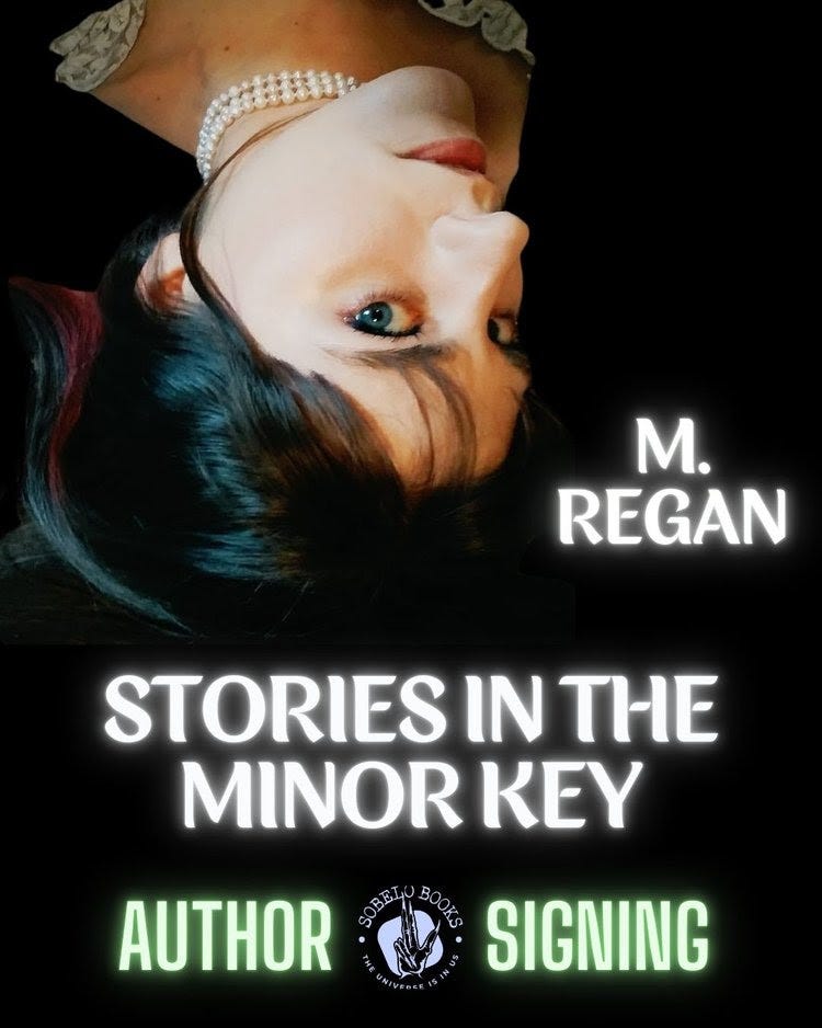 M. Regan author signing image