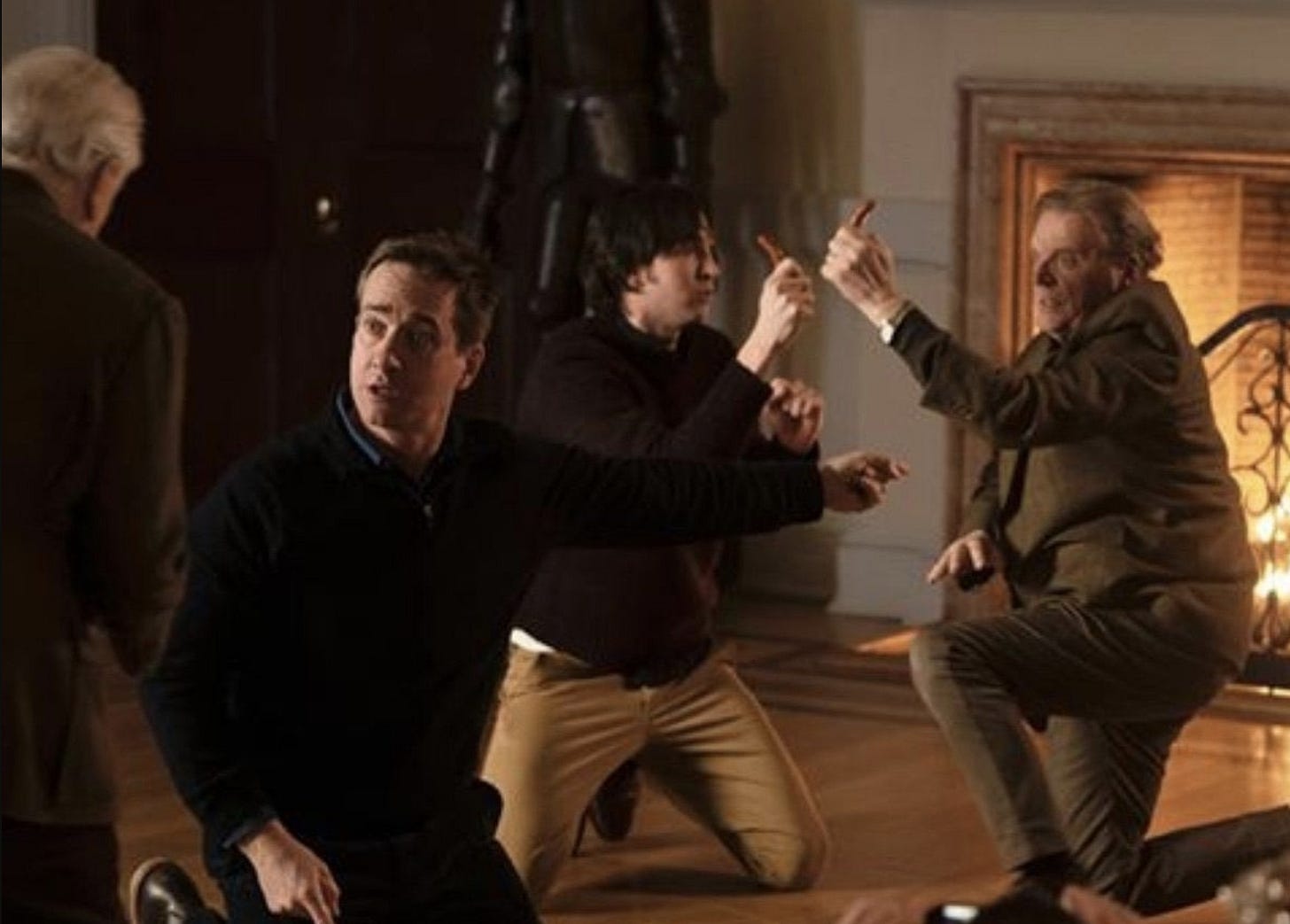 The boys playin' boar on the floor.