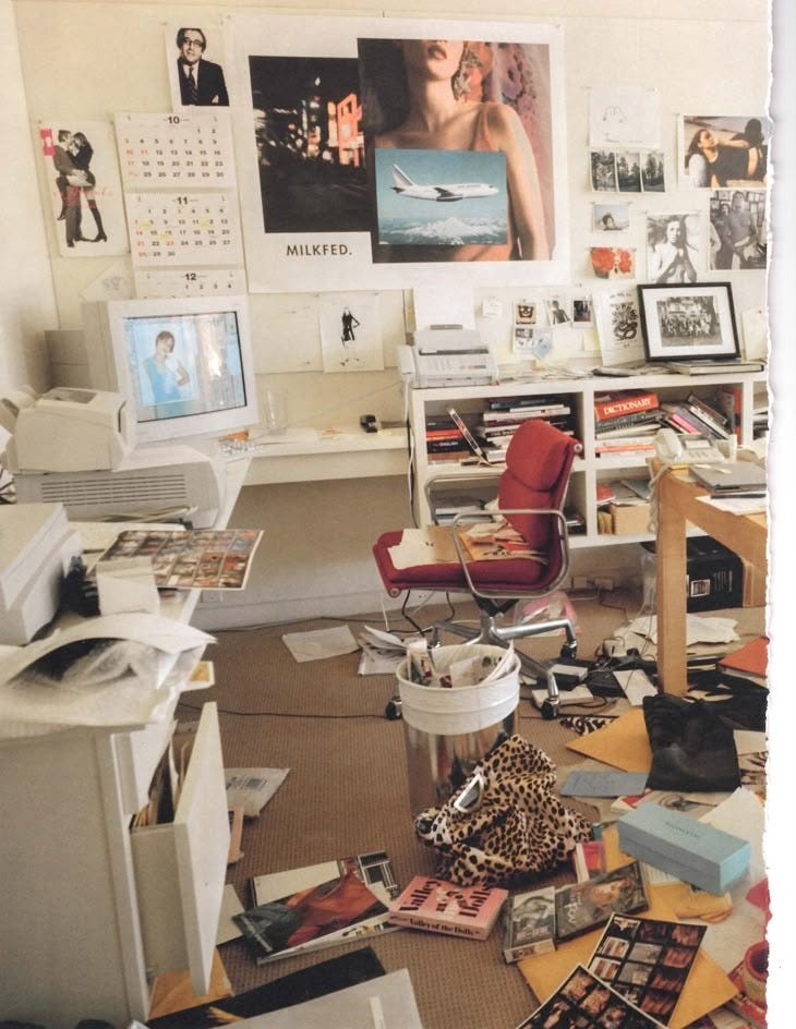 This may contain: a messy room with pictures on the wall