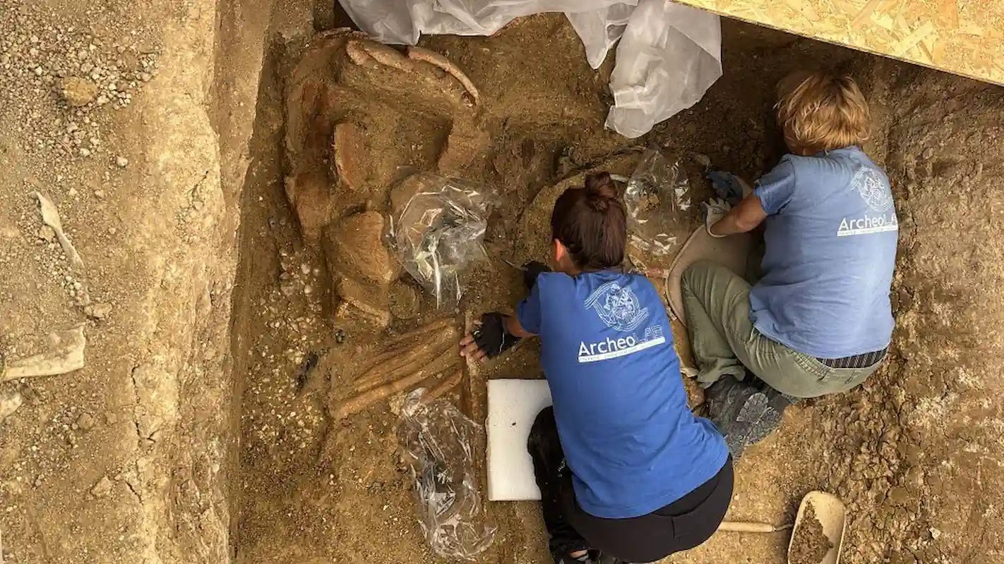 Archaeologists excavating the Tomb of the Chariot. Credit: Soprintendenza ABAP Ancona–Pesaro Urbino.