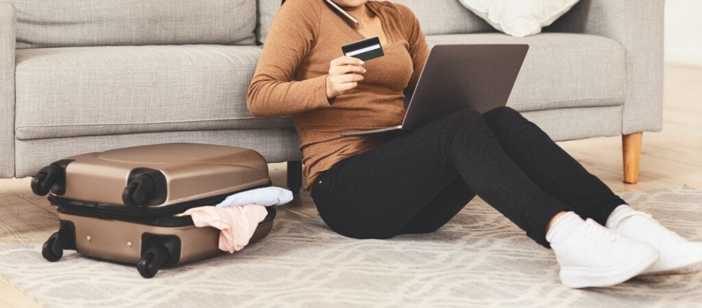Unrecognizable Woman Talking On Phone Holding Credit Card At Home Unrecognizable Woman Talking On Phone Holding Credit Card At Home