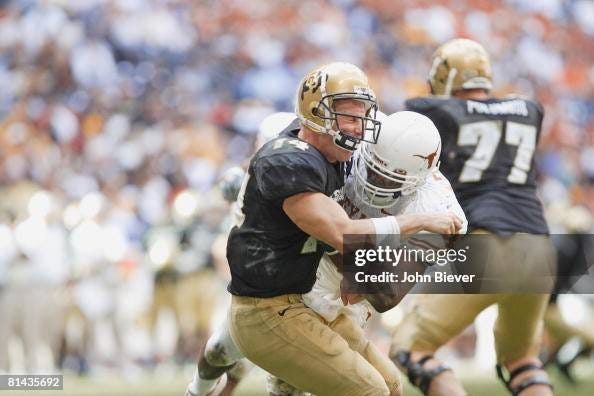 Big 12 Championship, Colorado QB Joel Klatt in action, getting hit by...  News Photo - Getty Images