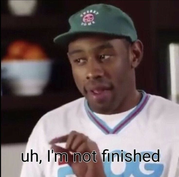 This may contain: a man wearing a baseball cap and holding a piece of food in his hand with the words uh, i'm not finished