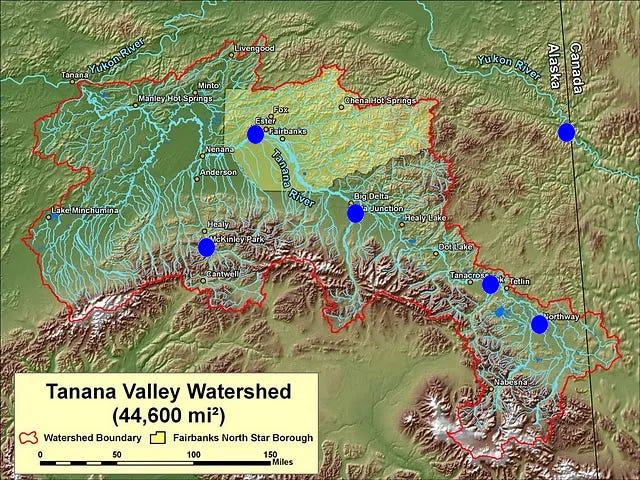 Map of the greater Tanana River Valley, Interior Alaska, showing terrain as a background color field, and many rivers and creeks in the drainage. Long term climate sites that reported the lowest March average temperature on record shown as blue dots.