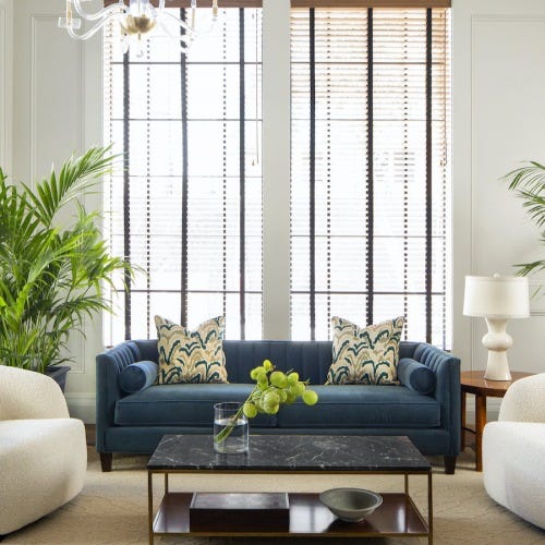 pictures of a beautiful lounge with artistic seating and paintings