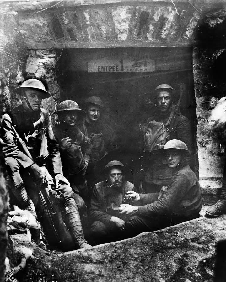 Doughboys of L Company, 3rd Battalion, 127th Infantry Regiment, 32nd Infantry Division in a former German dugout, Germany, 1918