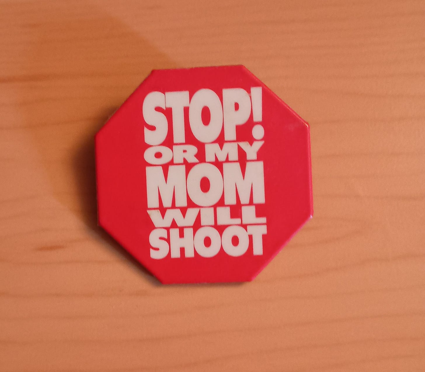 red stop sign pin saying "stop or my mom will shoot" red stop sign pin saying "stop or my mom will shoot"