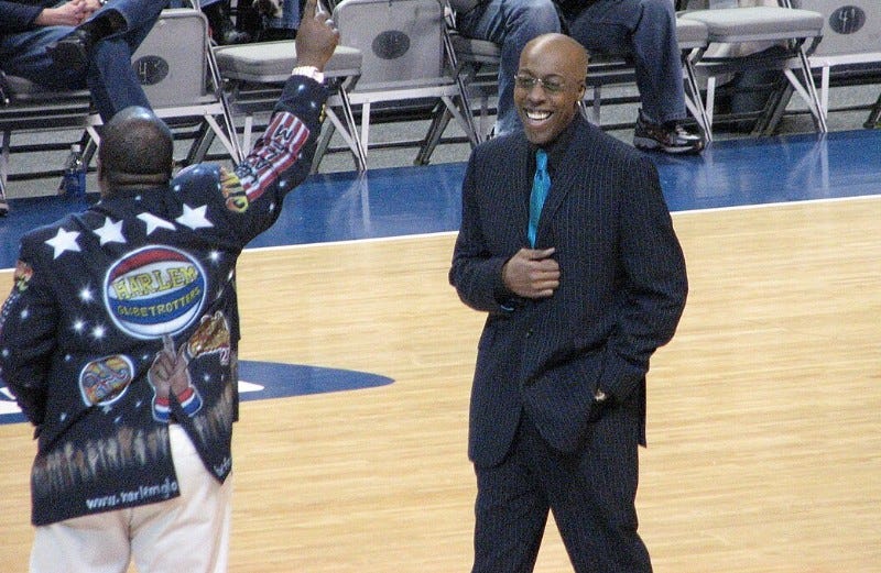 Talk show host Arsenio Hall at the Harlem Globetrotters Show Talk show host Arsenio Hall at the Harlem Globetrotters Show