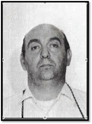A person with a serious face

Description automatically generated