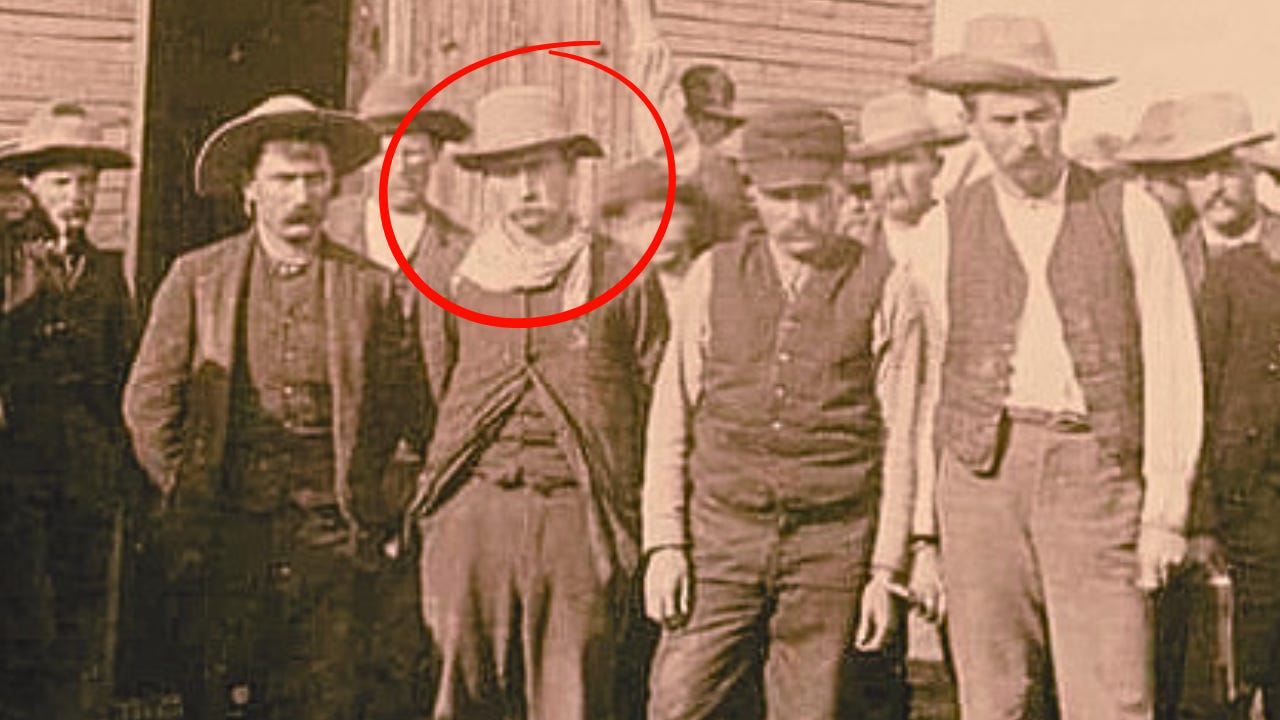 Photo of Brown and his accomplices after their arrest.