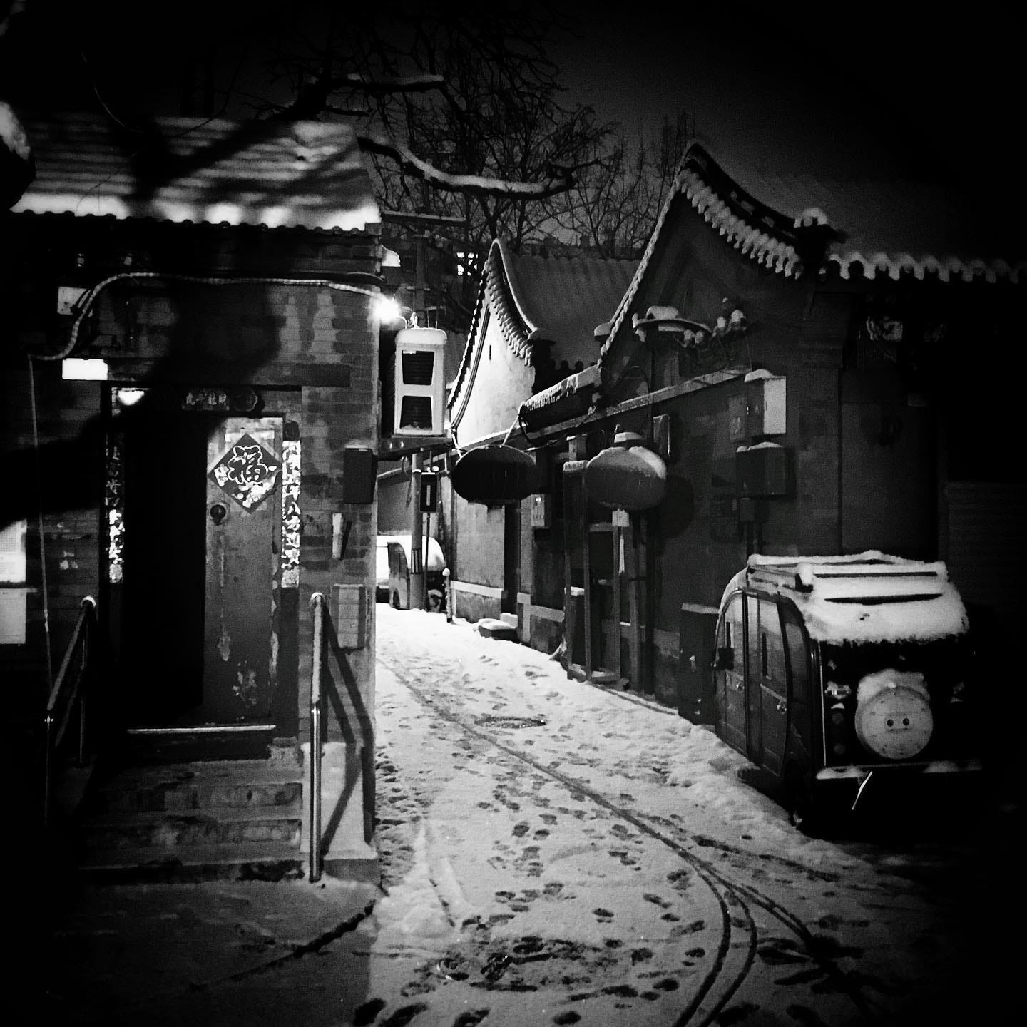 A snow-covered hutong in central Beijing.