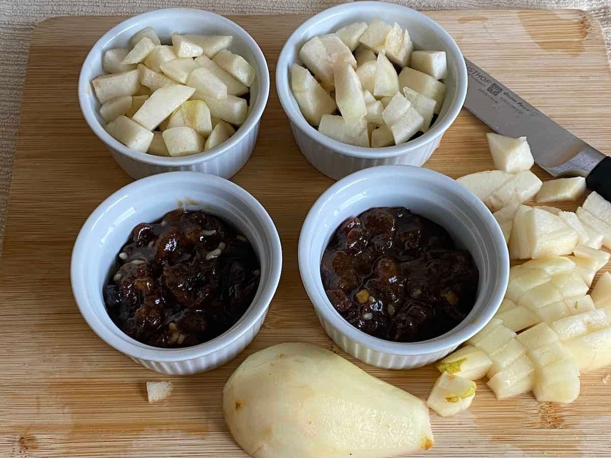 Pears and Mincemeat in white ramekins. Pears and Mincemeat in white ramekins.