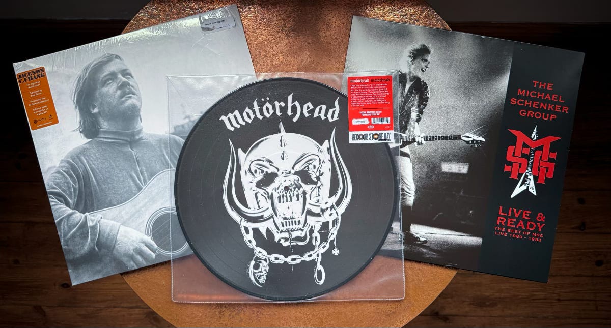 Three records sit on a table Three records sit on a table