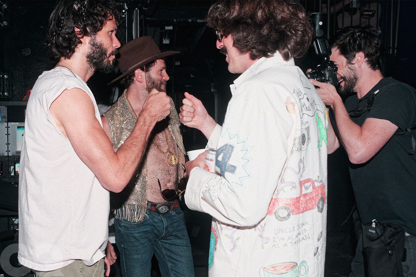 Image may contain Frank Zappa Andr Turpin Clothing Hat Adult Person Accessories Belt Jewelry Necklace and Camera