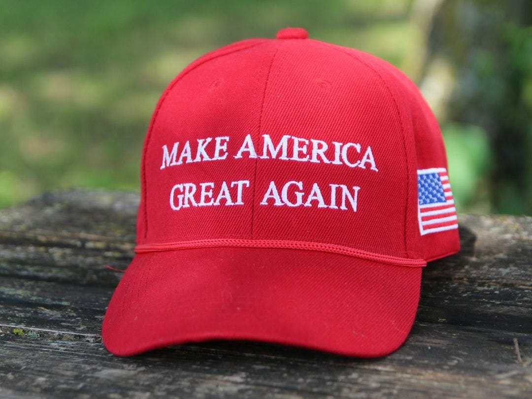 a red hat that says make america great again