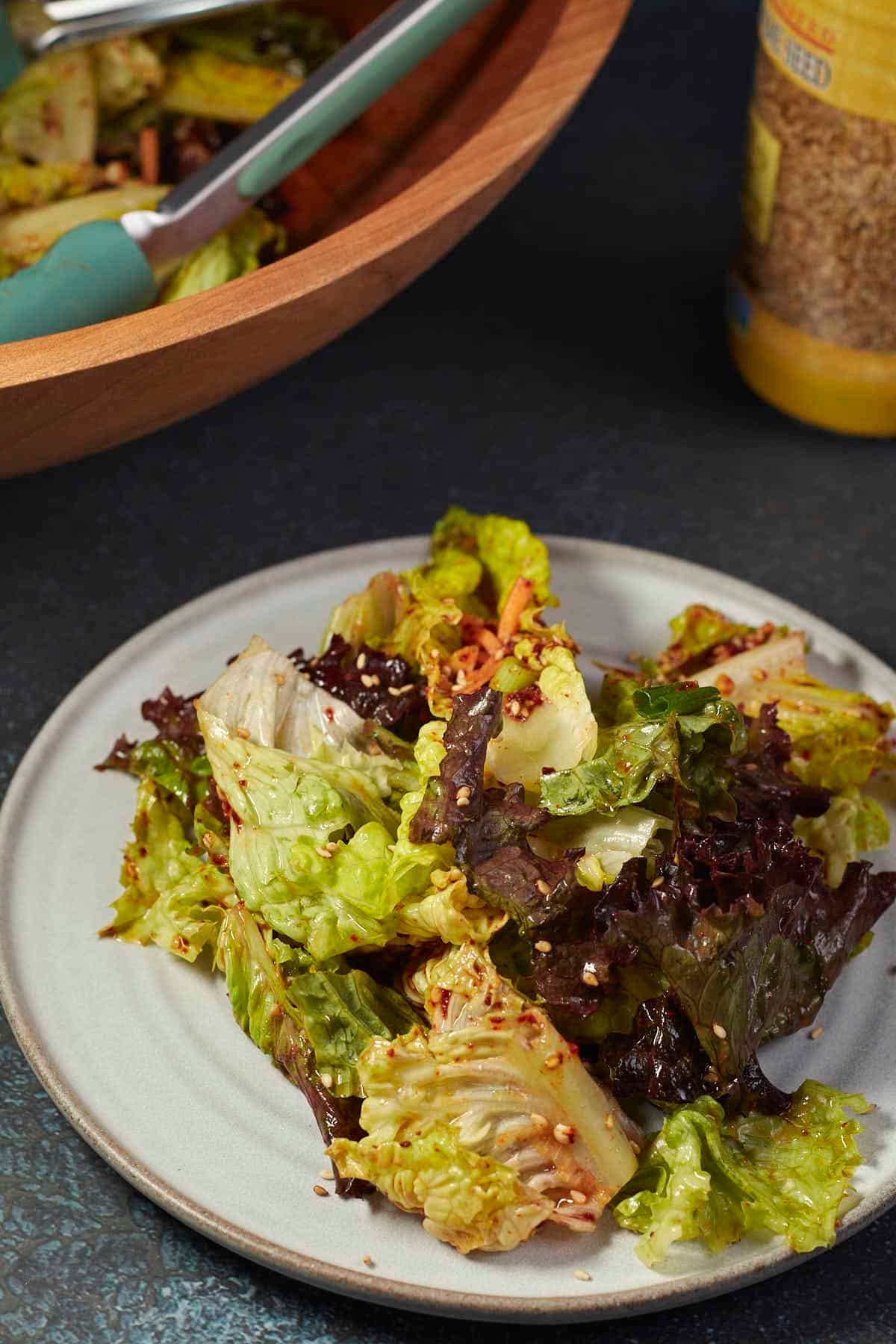bowl of korean lettuce salad with some sesame seeds