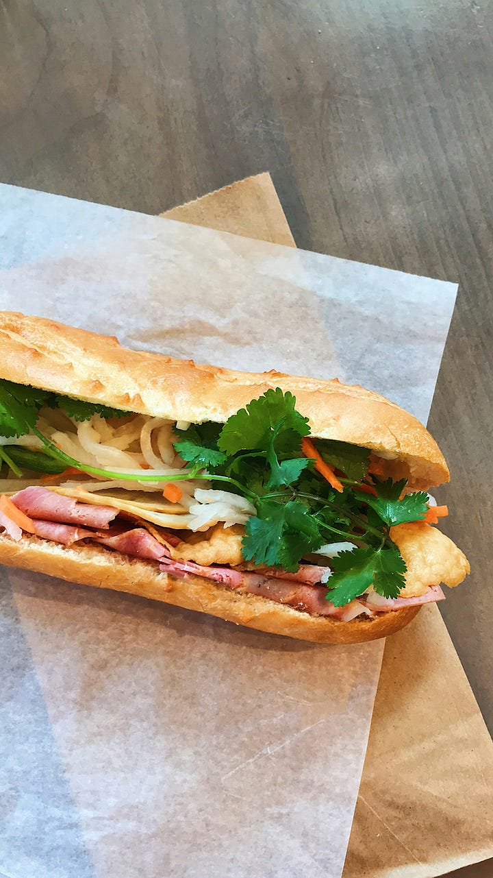A sub sandwich and some beautiful hot dogs. Photos by Amy Tran and 'LikeMeat' via Unsplash.