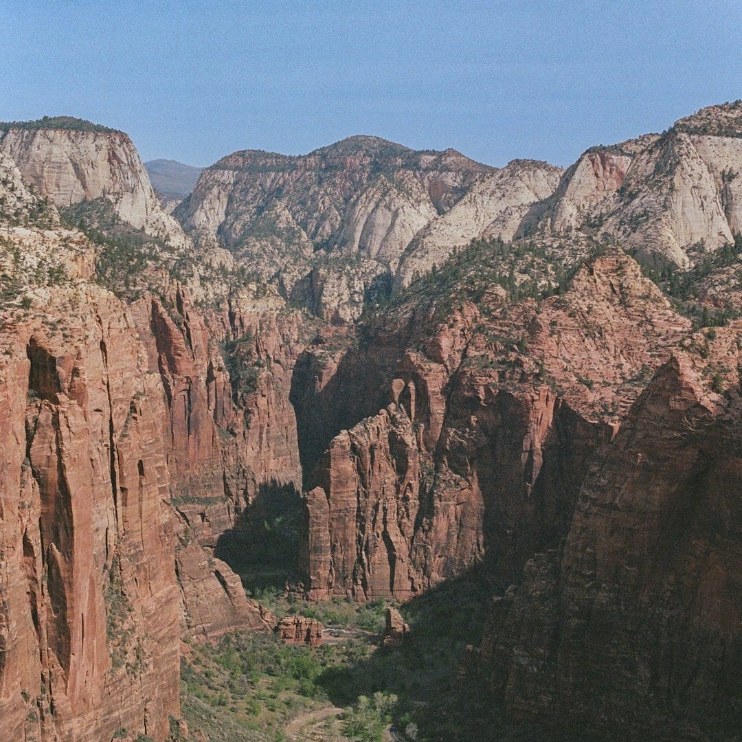 a canyon with a river running through it