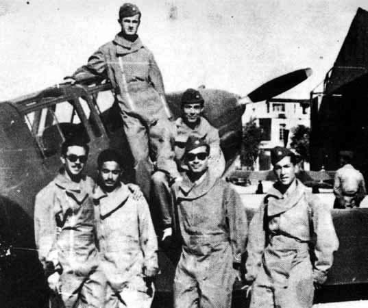 Group of soldiers next to a plane Group of soldiers next to a plane