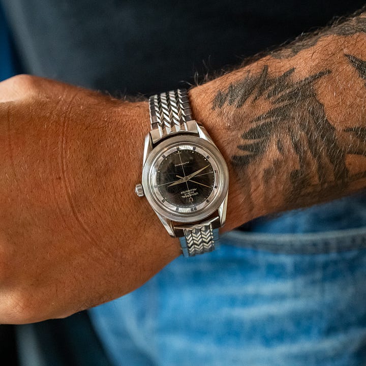 Universal Geneve Polerouter on a zig-zag bracelet and an early Rolex Datejust with no-lume honeycomb dial