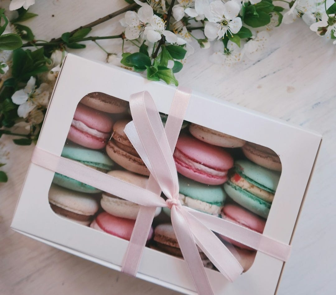 French macarons in white box