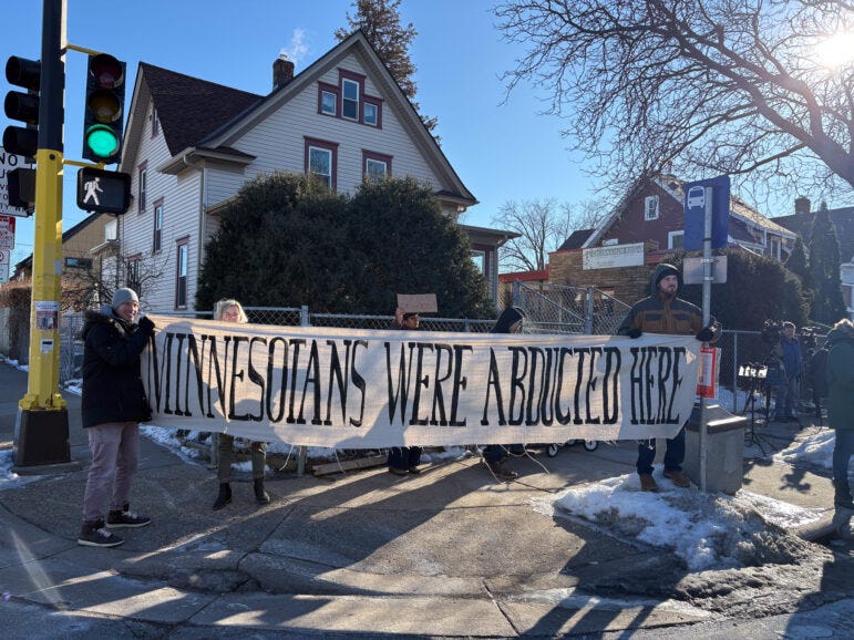 On the corner of Bloomington and 31st Street in South Minneapolis, workers with Metro Transit and allies held up a sign that read, “Minnesotans were abducted here.