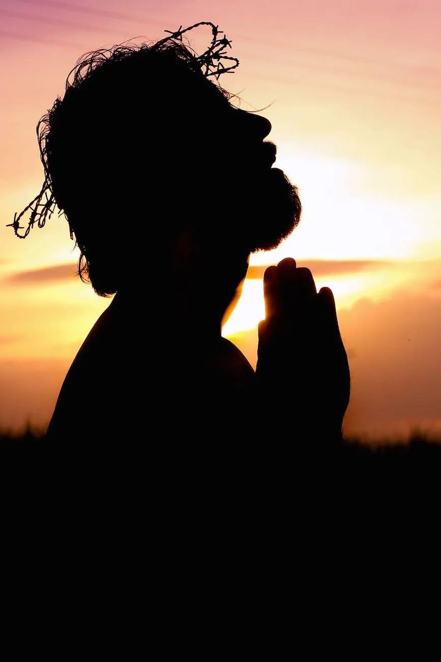 silhouette image of person praying silhouette image of person praying