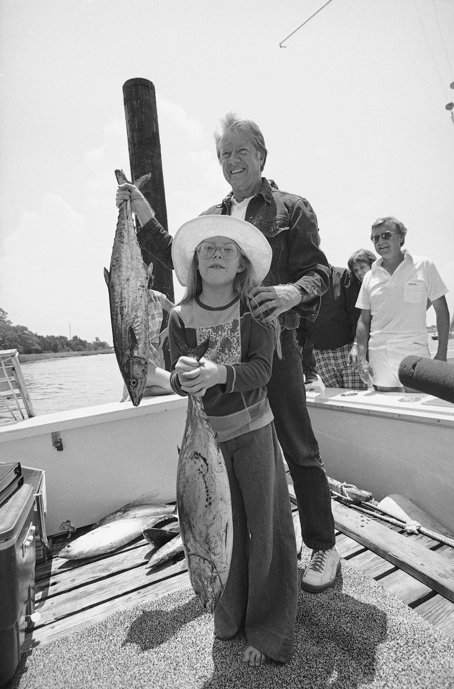 President Jimmy Carter and daughter Amy display their catch after a twelve-hour fishing trip off St. Simons Island, Georgia, May 29, 1977, during their family vacation. President Jimmy Carter and daughter Amy display their catch after a twelve-hour fishing trip off St. Simons Island, Georgia, May 29, 1977, during their family vacation.
