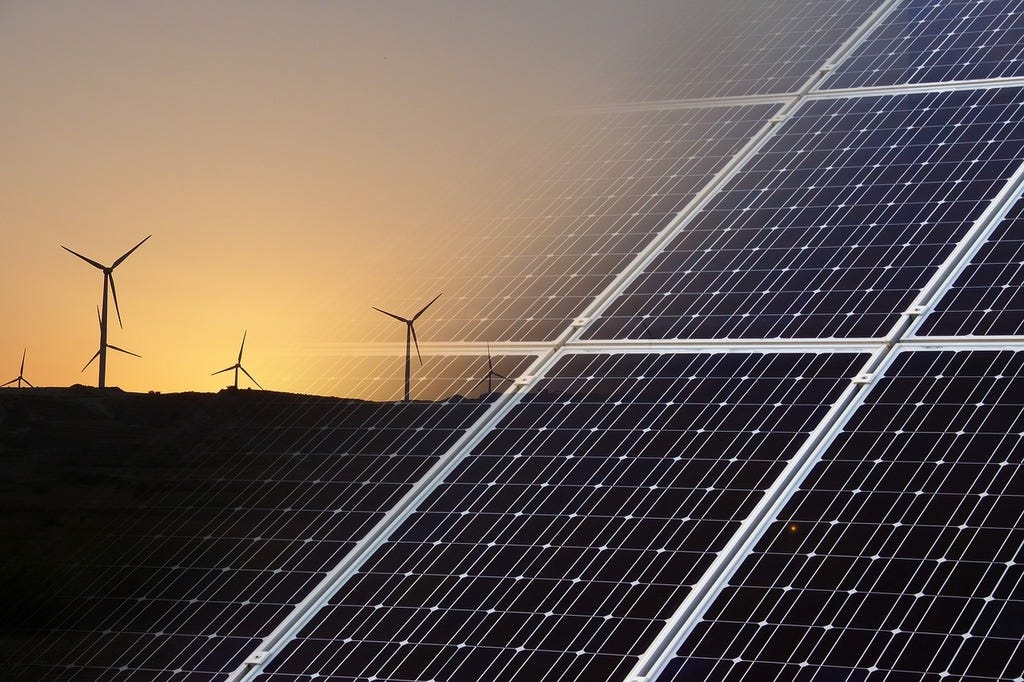 A solar panel with wind turbines in the background. Renewable energy  environment, science technology. - PICRYL - Public Domain Media Search  Engine Public Domain Search