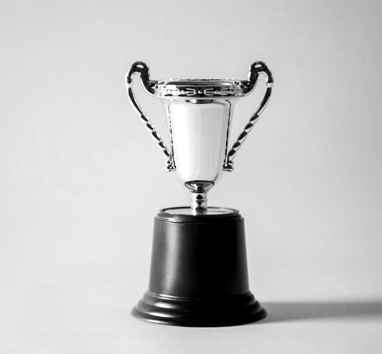 yellow and white trophy yellow and white trophy