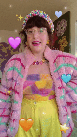 Shitty Craft Club gif woman wearing a lot of bright colored clothes saying I'm a minimalist