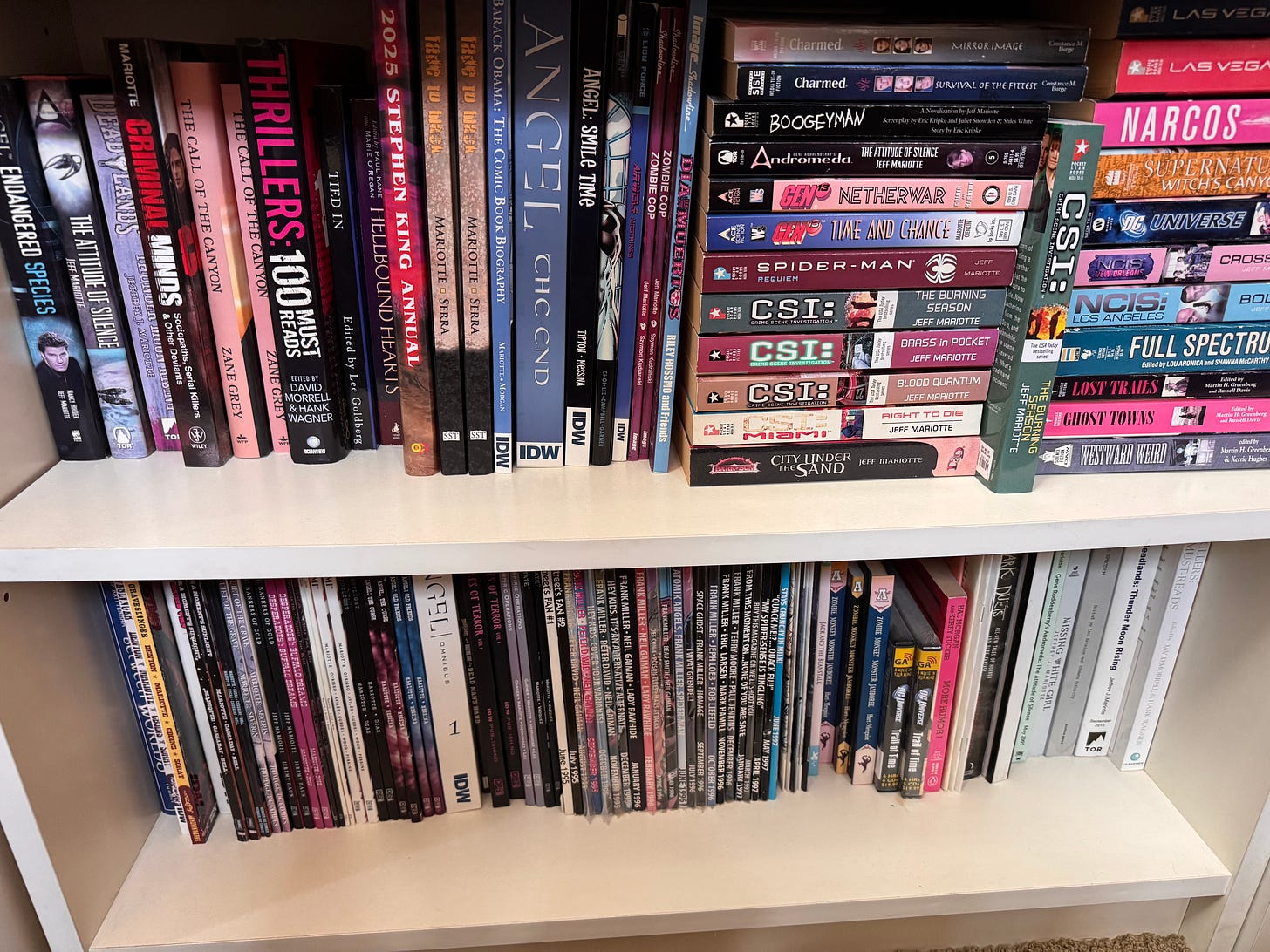 Two shelves of a bookcase containing things I've written Two shelves of a bookcase containing things I've written