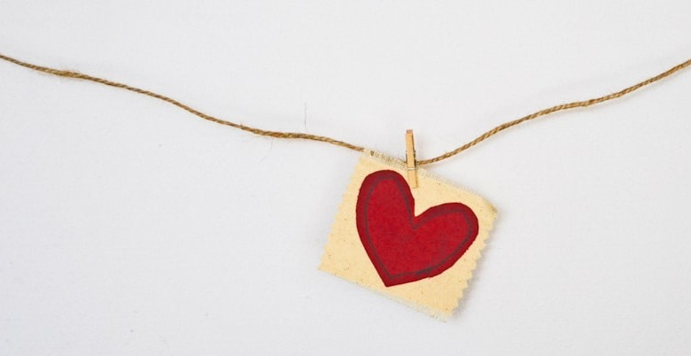 heart-shaped red and beige pendant