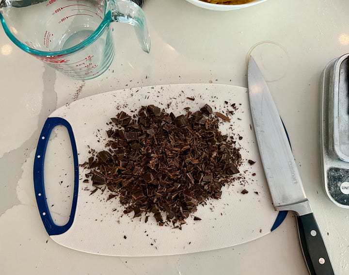 Chopping up dark chocolate for cookies