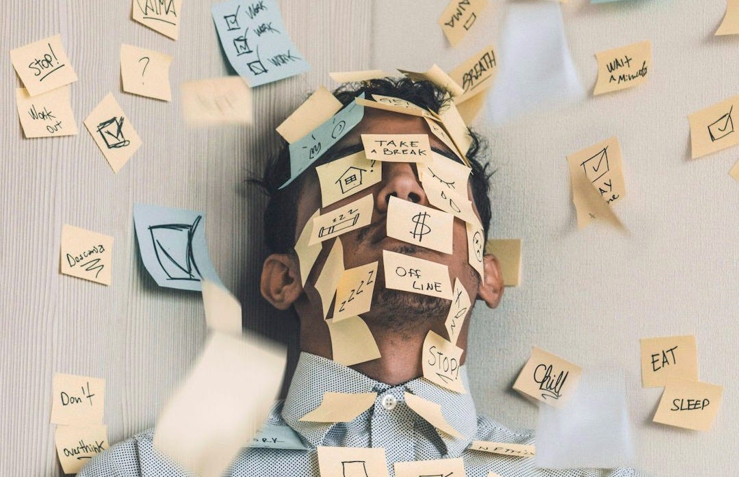 people sitting on chair with brown wooden table
