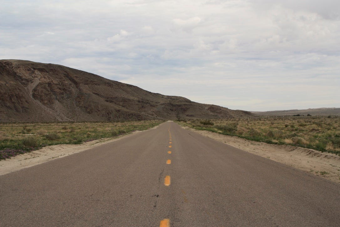 A picture containing sky, road, outdoor, way

Description automatically generated