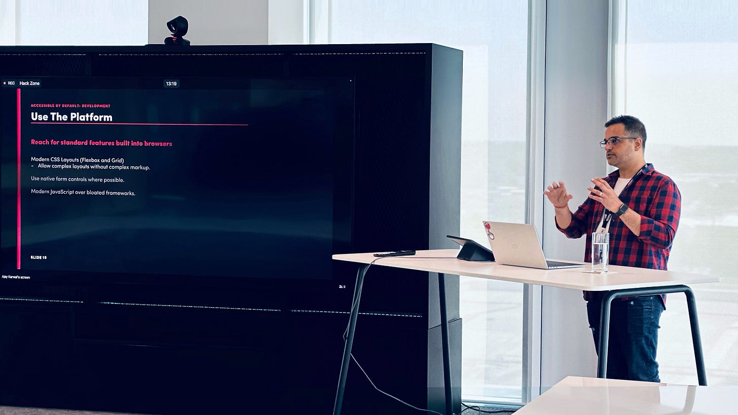 Photo of Ajay Karwal speaking at a presentation about web accessibility