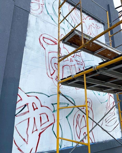 Series of nine photos depicting the evolution of my mural "Bound Together" located at 10th and Callowhill Streets in Philadelphia's Chinatown area.