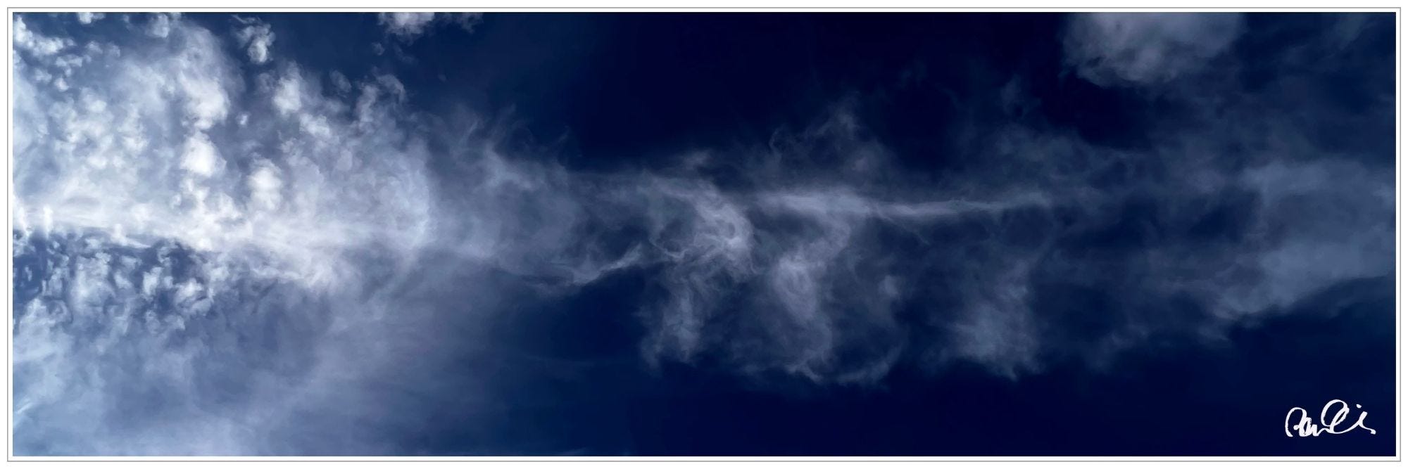 airplane contrails scattered by wind