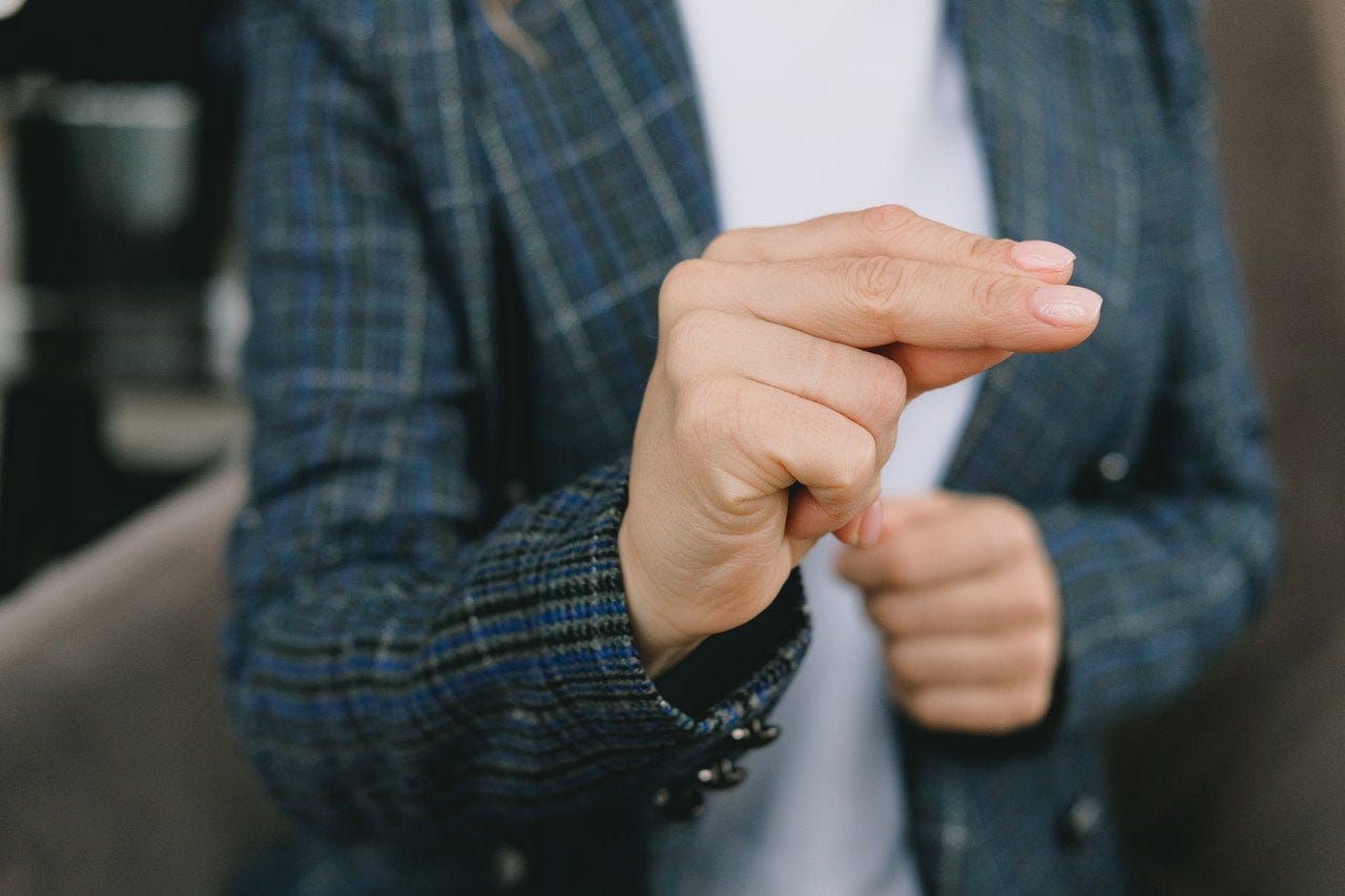 Person signing “No” in American Sign Language (ASL) Person signing “No” in American Sign Language (ASL)