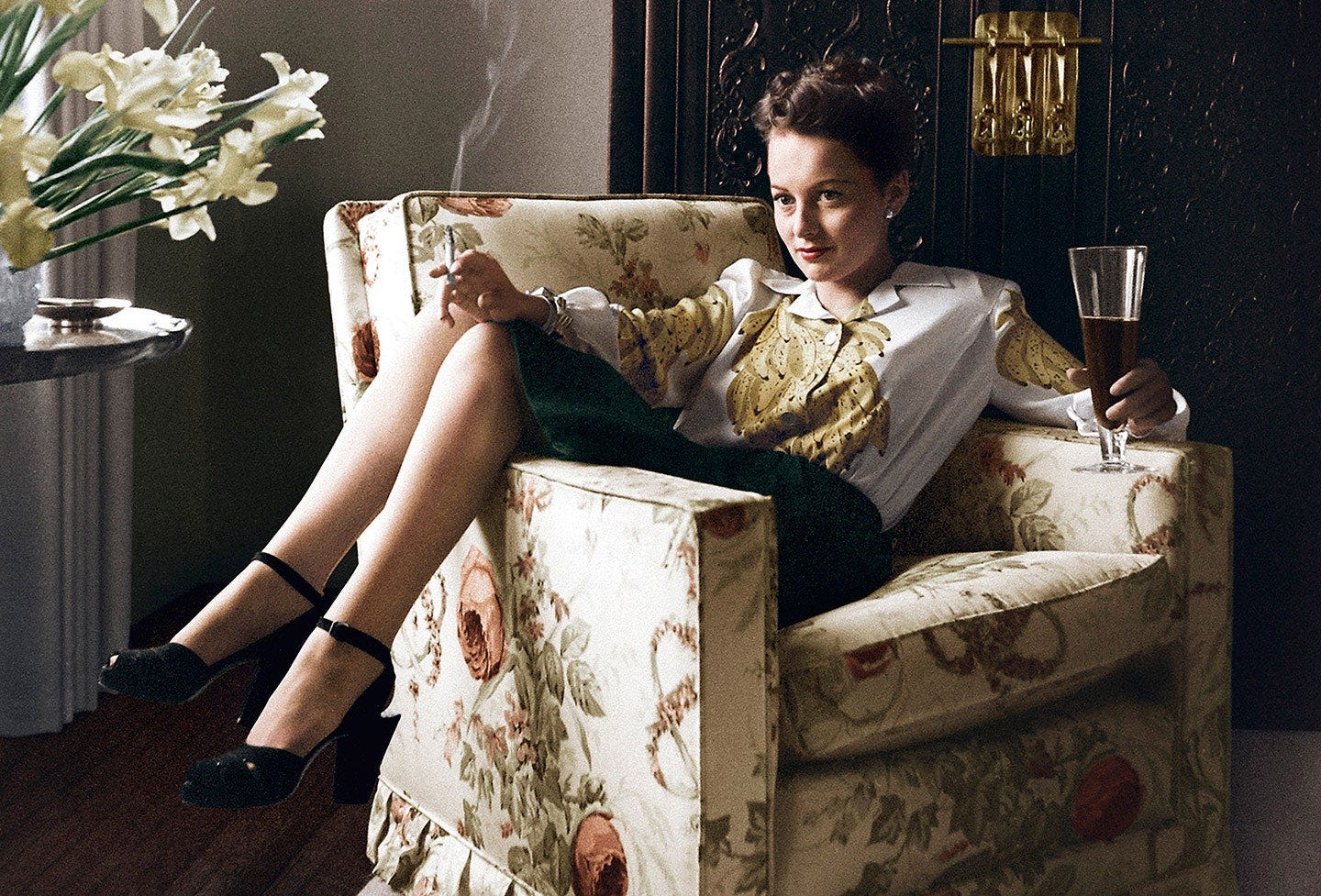 Image may contain Furniture Couch Armchair Human and Person