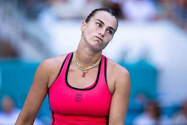 Aryna Sabalenka reacts during her match against Coco Gauff of the United States on Day 12 of the Miami Open at Hard Rock Stadium in Miami Gardens,...